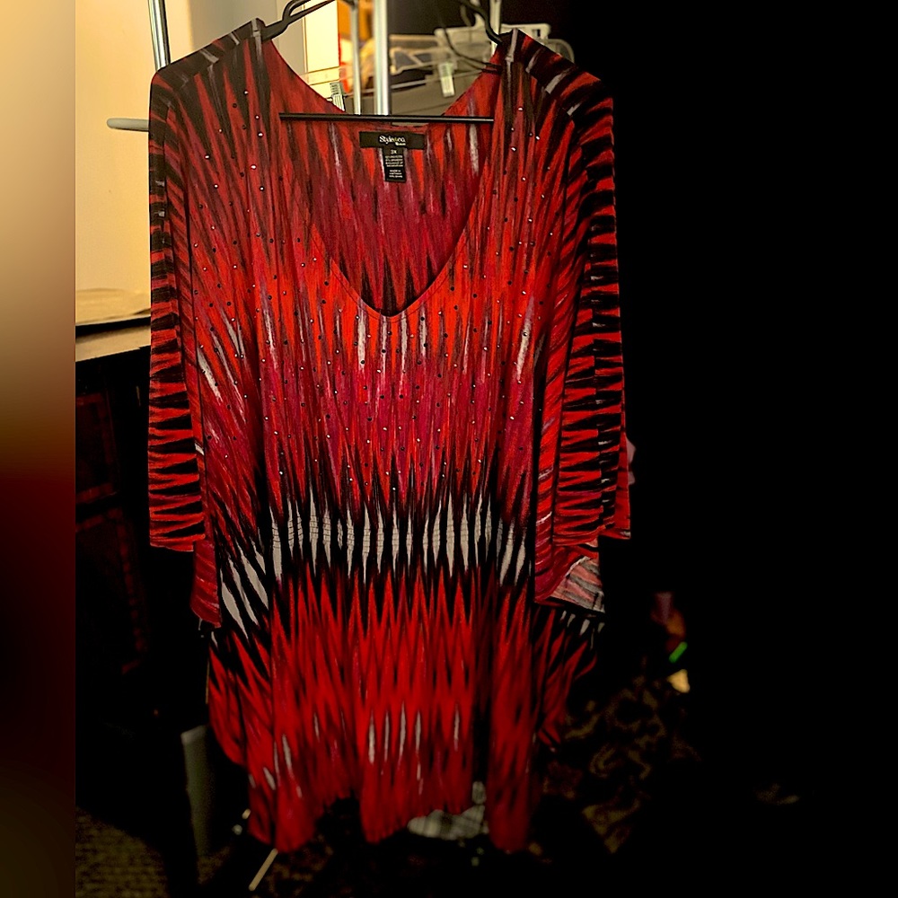 Pretty multicolored top with bling on chest.